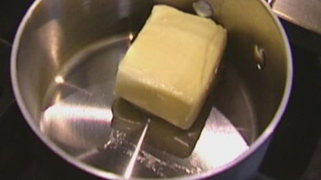 яблочный пудинг с сушеной клюквой и грецкими орехами