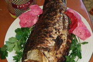 Сазан, запеченный с гречкой, по-астрахански