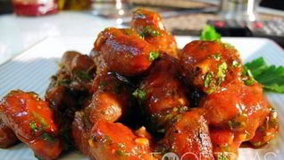 Тушеные куриные сердечки