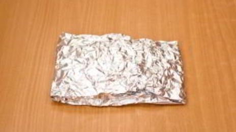 рыба, тушенная с овощами в фольге